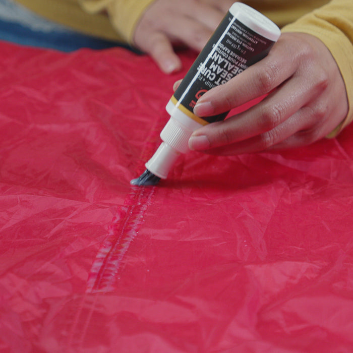 Aplicación de Seam Grip FC en costuras