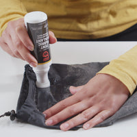Aplicación de Seam Grip TF en tejido de tienda