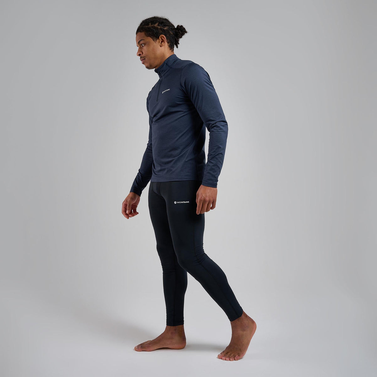 Camiseta Montane Dart XT Zip Neck Eclipse Blue en montaña