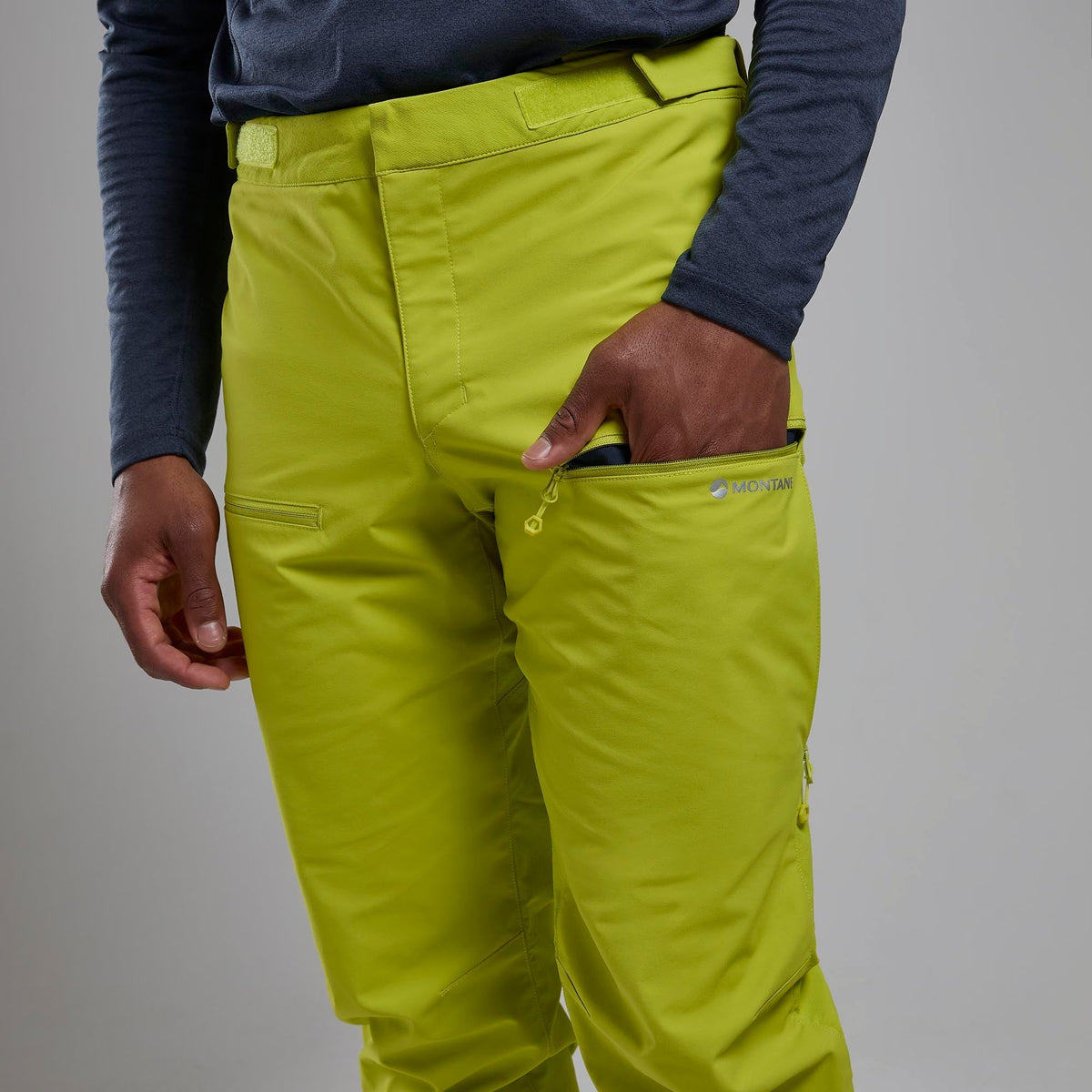 Montane Nordes Pants para hombre en Citrus Spring - detalle en uso